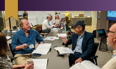 Attendees discuss among themselves during the Facilitator Certification Program