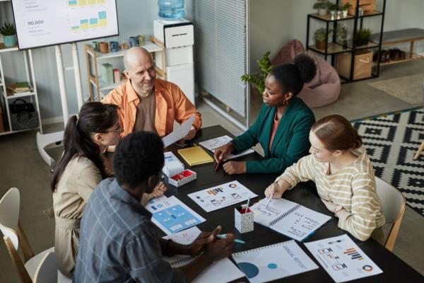 diverse-business-team-meeting-at-table