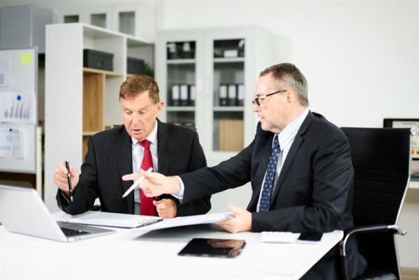 businessmen-in-formal-suits-planning-project-strat-